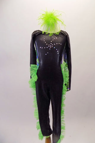 Long sleeved full unitard is a black base with crystal sunburst design on the bodice. The sides from arms to legs are a marbled pattern of mixed blues and greens with green organza ruffle extending from the hips down the length of both legs. Comes with green feather hair accessory. Front