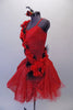Stunning red romantic tutu is covered with fabulous details.  The red tulle base sits below a red and silver sparkle overlay with gathered bustle sides. An attached 3D sash of red roses and black feathers cascades along the bodice from shoulder to hip.  Comes with a rose hair accessory. Left side