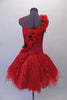 Stunning red romantic tutu is covered with fabulous details.  The red tulle base sits below a red and silver sparkle overlay with gathered bustle sides. An attached 3D sash of red roses and black feathers cascades along the bodice from shoulder to hip.  Comes with a rose hair accessory. Back