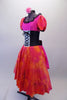 Theatrical dress is both peasant and royalty all at once. The layers of petticoat and pink bustle with a bow, create loads of volume beneath a colourful skirt in shades of red pink & orange. The skirt portion of the dress compliments the pink bodice, ruffled neckline, pouffe sleeves and faux corset laced waistband. Comes with Pink rose hair clip. Side