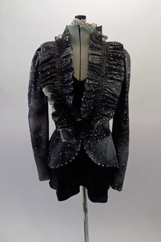 Eclectic costume is a short unitard in shades of grey-black with silver swirled fabric. The top is a faux peplum blazer with a pleated ruffle collar that crosses at the front waist to reveal a black bra beneath. Comes with crystal hair barrette. Front