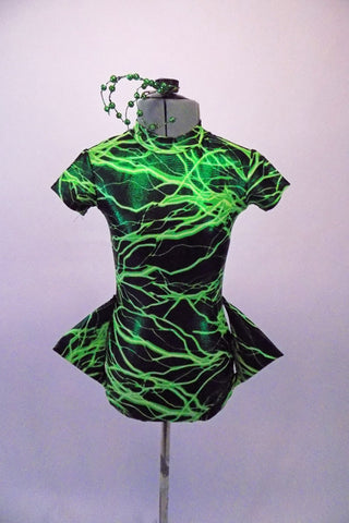 Funky, short sleeved leotard is a black base with green electric lightning pattern throughout. The hips have an attached fin accessory for the alien feel. The back has a circular keyhole opening at top with an open waist area. Comes with matching velvet thigh-high socks with hooped green ankle accents and hair accessory. Front