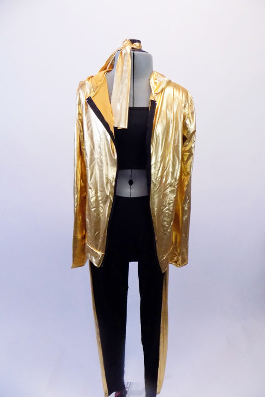 Black leggings have a wide gold stripe down the outside of each leg. There is a matching black half top that sits beneath a thin gold metallic lame hooded zip-front jacket. Comes with a gold hair tie. Front