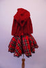 Black velvet leotard has a red glittery tartan pattern in the fabric. The accompanying red tartan skirt has gold waistband and sequin accent with black lace trim and tricot black petticoat. The finishing piece is a removable, gold lined, sparkly red hooded cape. Back