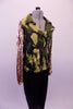 Black parachute pants are paired with a camouflage print front zip, lapelled jacket with sequined gold lame sleeves. Side