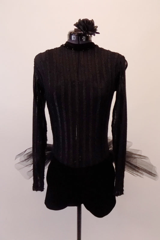 Black high neck, long sleeved short unitard has a sheer striped pattern torso & velvet bottom. A black bra top sits beneath the leotard but can be worn with sticky cups with open back. The tulle tutu style bustle skirt gives a costume a unique twist. Comes with a floral hair accessory. Front