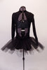 Black high neck, long sleeved short unitard has a sheer striped pattern torso & velvet bottom. A black bra top sits beneath the leotard but can be worn with sticky cups with open back. The tulle tutu style bustle skirt gives a costume a unique twist. Comes with a floral hair accessory. Back