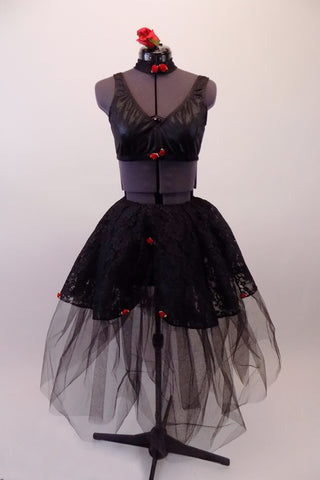 Black romantic tutu sits below a black lace overlay accented with small red rosettes. The black shimmery bra top has rosette accents at front. Comes with black bra, rosette-adorned choker and rose hair accessory. Front