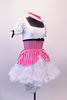 Mary Poppins themed four-piece costume has a pink & white striped leotard with white bust & pouffe sleeves with black velvet bow trim accent. The skirt is comprised of a pull-on striped overlay that sits on top of a fluffy white petticoat. The knee length satin bloomer completes the look. Comes with a white straw hat. Right side
