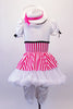 Mary Poppins themed four-piece costume has a pink & white striped leotard with white bust & pouffe sleeves with black velvet bow trim accent. The skirt is comprised of a pull-on striped overlay that sits on top of a fluffy white petticoat. The knee length satin bloomer completes the look. Comes with a white straw hat. Back