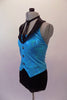 Glittery turquoise halter vest top has black lapels, button accents and an attached necktie collar. The costume comes with black bootie shorts. Side