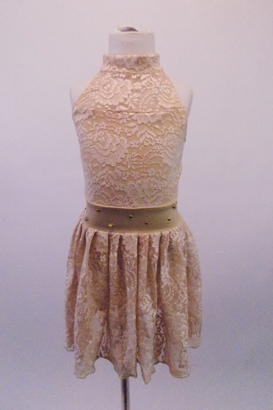 Pretty nude based ivory rose lace halter dress has an open back and gold crystal accents along the waistband. Perfect for a lyrical routine. Comes with a floral hair accessory. Front