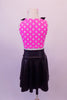 50’s inspired two-piece costume has a black knee-length circle skirt paired with a cute pink and white polka dot half top with black collar covered in each dot with Swarovski crystals. To complete the outfit there are black stretch footless socks with pink bows, pink polka dot wristlets and matching polka dot hair bow. Back