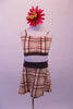Two-piece tartan costume is a blend of cream brown, white and red. The brown banding along the bust compliments the waistband of the faux wrap short skirt. Comes with a floral hair accessory. Front