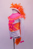 Magical horse themed costume is a white sequined leotard with a ruffled collar of pink and orange. The ruffles compliment the orange & pink criss-cross pattern center torso. The back has an orange tulle ruffle & large boa feather tail. The hat has ears and orange mane. Side