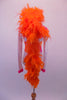 Magical horse themed costume is a white sequined leotard with a ruffled collar of pink and orange. The ruffles compliment the orange & pink criss-cross pattern center torso. The back has an orange tulle ruffle & large boa feather tail. The hat has ears and orange mane. Back with hat