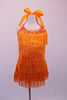 Orange fully fringed dress has crystalled neckline and tie-up halter collar. The deep low back has a wide mesh crystal lined horizontal band. Front