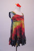Deep jewel colours of blue red yellow & green combine in a 60s inspired hippie tie-dye style empire waist dress. The gathered bust gives rise to wide shoulder straps & a lower back. The knee length dress has a large ruffle at the bottom. Comes with an orange floral hair accessory. Right side