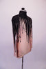Uniquely creative nude based short unitard has long sleeves high neck and small keyhole back. The costume appears to have black paint or melted wax spilling down from the neck running and dripping down the torso. Side