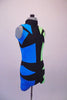 Futuristic short unitard has a turquoise right side and a pale green left side. The two sides are divided by an intricate geometric pattern of black that is a mirror image at the front and zip-close back. Gives the appearance of a mirror or silhouette. Right (blue) side