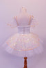 Professional pleated & hand tacked pancake tutu is perfect for the pre-teen ballerina. The white tutu is scattered with crystals & has a cream sequined split overlay with sequined edging. The bodice has a matching sequined V-panel front edged with gold braiding. Comes with lightly ruffled sequined tulle armbands. Back