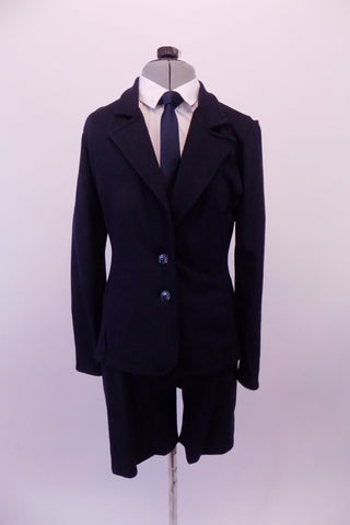 Dress suit style costume is a thick stretchable navy blue knit. It comes with thick a button front, tapered blazer with full lapels and matching pant-style zipper front shorts. The white long-sleeved shirt and navy blue tie complete the professional business look. Front