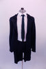 Dress suit style costume is a thick stretchable navy blue knit. It comes with thick a button front, tapered blazer with full lapels and matching pant-style zipper front shorts. The white long-sleeved shirt and navy blue tie complete the professional business look. Front with jacket open