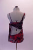 Two-piece costume has a purple, red and grey marbled sarong style half top and skirt as the base. The top crosses over the right bust with silver accents and wraps asymmetrically and ties up at the left back. The left bust reveals a beautiful hand painted purple-grey bra. Back