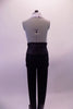 White slinky halter leotard has an open back and the front is comprised of two panels that extend from the waist and attaches at the back of the neck leaving the front centre exposed. The high, wide-waisted slim pants have a built- in large belt and buckle accent. Comes with a hair accessory. Back