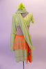 3-piece costume has a traditional taste of India with a Bollywood feel. Pale green beaded lace covered half-top has cap sleeves & beaded scallop trim. It is complemented by a single Bishop-sleeved half-shrug that extends into a long wrap scarf. The matching skirt has orange peplum overskirt with a beaded kerchief. Front