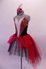 Romantic ballet tutu dress has a Russian-style bodice of black velvet with red & gold spiral accent at back and front surrounding a white deep V-front decorated with crystals & sequined piping. The white tulle base is covered by black tulle & a red tulle bustled overlay. Comes with hand painted mask and white gloves. Side
