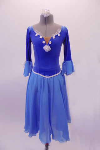 Lovely blue ballet dress has a velvet round neck bodice with white floral details and lace accents. The long sleeves have a trumpet chiffon detail that matched the long chiffon skirt. The low scoop back has a hook and eye closure and large white tie-bow. Comes with a white floral hair accessory. Front