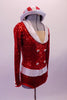 Bold, bright red fully sequined long-sleeved leotard had white lapel collar & belt with crystal buckle accent. The front has crystal accents & four large crystalled buttons on the torso. The back is a large open keyhole style and the costume is completed by a red and white sequined striped hat. Side