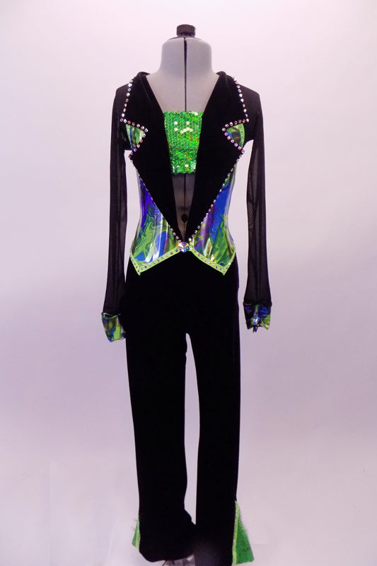 Black based full unitard has green sequined triangle leg accents to match the green sequined bandeau bust. The blazer style top has wide lapel collar lined in large crystals that open to reveal the green bandeau. The body of the jacket has a metallic marbling of blues & greens that match the cuffs of the sheer sleeves. Front