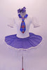 Cute white pancake tutu has a white velvet bodice with pouffe sleeves and blue collar. The skirt overlay is a denim with lace edging that matches the tartan tie. Comes with blue hair bow accessory. Front