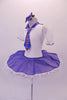 Cute white pancake tutu has a white velvet bodice with pouffe sleeves and blue collar. The skirt overlay is a denim with lace edging that matches the tartan tie. Comes with blue hair bow accessory. Side