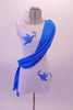 Short white tunic dress has hand-painted blue doves with an olive branch in the right bust and left hip. A blue sash cascades from left shoulder, across the torso to the right hip. Comes with white brief and hair accessory. Front