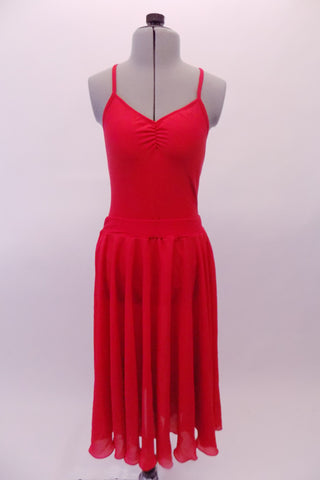 Beautifully simple, thin cross backed red leotard has a low back and lovely long flowing attached skirt. Makes a beautiful flowing costume that shows well on stage. Comes with matching hair accessory. Front