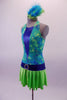 Turquoise, lime green & royal blue dress has a halter neckline with tie-dye pattern and  deep-V royal blue inlay lined with crystals at front. The attached skirt is lime green with royal blue waistband & crystal belt buckle accent. Comes with lime green crystalled gauntlets with blue banding & matching hair accessory. Side