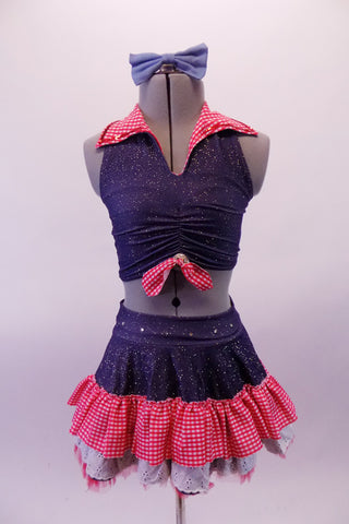 2-piece costume is a glitter stretch denim based half-top with gather front, red and white checkered gingham collar and tie accent. The matching skirt has checkered gingham and white eyelet lace ruffles above layers of a red tulle attached petticoat. Comes with denim hairbow. Front