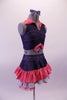 2-piece costume is a glitter stretch denim based half-top with gather front, red and white checkered gingham collar and tie accent. The matching skirt has checkered gingham and white eyelet lace ruffles above layers of a red tulle attached petticoat. Comes with denim hairbow. Side