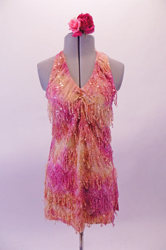 Pink-orange halter dress with pinch-gathered bust has scalloped sequin fringe pattern throughout the fabric. Comes with a rose hair accessory. Front