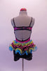 Short unitard has a black bottom and the top is fuchsia with a colourful tartan bust and torso section edged with black lace. The attached back bustle is comprised of layers of yellow and turquoise organza curly ruffle and layers of gathered tartan and organza. Comes with matching hair accessory.  Back