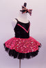 Funky orange and black two-piece costume has a black bodice and tutu skirt. The large mesh sequined orange overlay sits over the tutu skirt and compliments the crystalled orange V at the front of the bodice. An orange mesh shrug completes the look. Comes with a large black, orange sequined hair bow. Right side no shrug