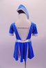 Flight attendant style costume is a short-sleeved bright blue velvet with silver banding, waistband and pleats. The deep V back is held by a horizontal crystalled strap.  Comes with a matching blue velvet attendant hat. Back