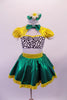 2-piece costume is a yellow pouffe sleeved half top with Peter Pan collar, black & white spotted bust & green banding along the large keyhole back. The green skirt has a yellow waistband that becomes a large bow at the back & a yellow ruffle trim. Comes with yellow gauntlets a floral hair accessory & green bow tie. Front