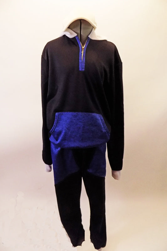 Two-piece hip-hop costume has a black fleece hoodie with blue pock front, zipper accent and a white hood lined with blue. The matching black fleece drop-crotch harem has large blue wrap-style pockets. Front