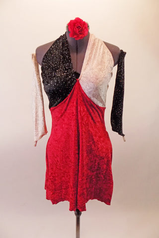 Crushed velvet tri-coloured skirt dress has a halter neck and wide leg short bottom. The left bust is white and right is black, both with sparkle accents. The body and bottom are red and pops the black and white. Comes with black and white gauntlets and floral hair accessory. Front