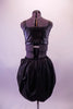 Black leatherette vest/half-top has a zip front. The bottom is shorts with an attached overlapping bubble pouffe bustle skirt. Comes with a spiked necklace accessory. Back