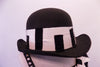 Black bowler hat with piano key design band